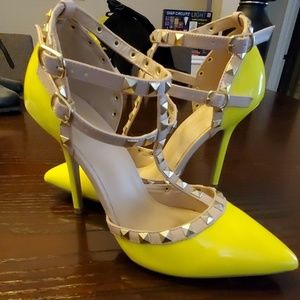 Bright yellow studded heels